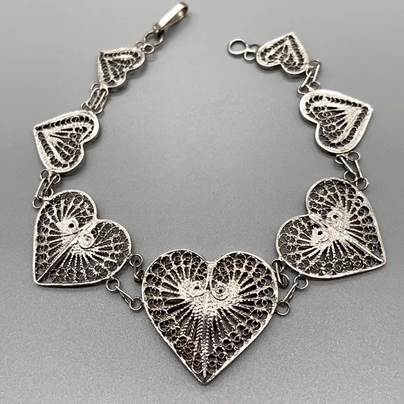 Vintage graduated heart shaped filigree bracelet 8 inches in sterling sterling - Picture 1 of 7